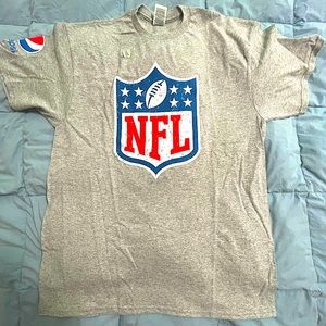 NFL/Pepsi t-shirt. NFL logo on front, Pepsi logo on right shoulder. Never worn
